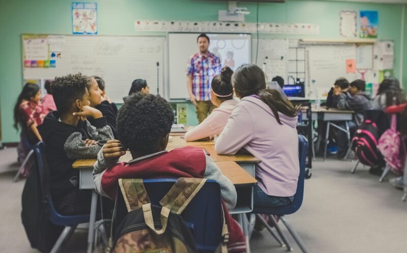 Diverse group of children engaged in a classroom activity