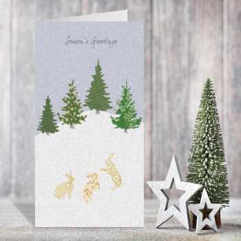 Three snow hares Christmas card -  designed by Eloise Hall - 15.7 x 11cm and blank inside, made in the UK