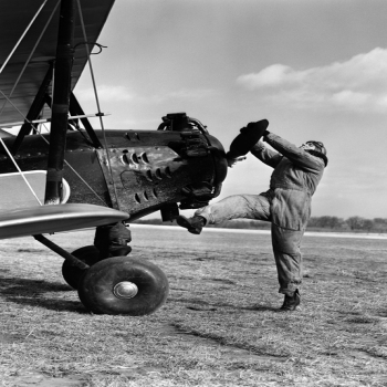 Holy Mackerel pilot retro black and white photographic card featuring a vintage image of an aviator and his plane - 12.6 x 17.7cm and blank inside
