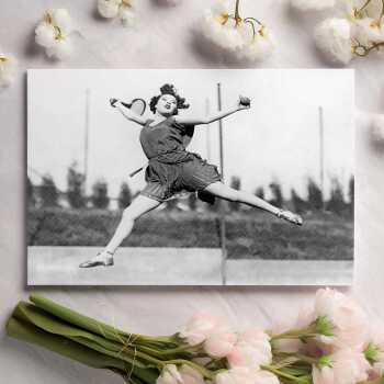 Flying return, black & white vintage photographic card featuring a tennis player mid leap - 12.6 x 17.7cm and blank inside - made in the UK