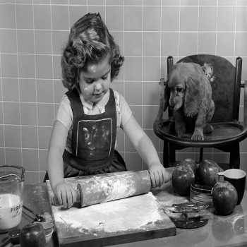 Holy Mackerel pastry pals retro black and white photographic card featuring a vintage image of a girl and her pet dog baking - 12.6 x 17.7cm and blank inside