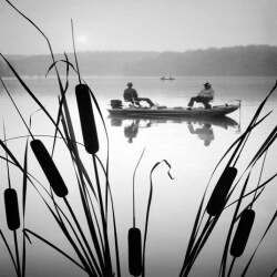 Holy Mackerel two men fishing retro black and white photographic card featuring a vintage image of friends angling from a boat - 12.6 x 17.7cm and blank inside