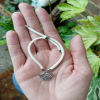 White kids bracelet with a Butterfly Charm