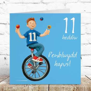 Welsh 11th Birthday Card for Boy - Unicycle Juggler by Erica Sturla - Penblwydd Hapus UK