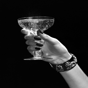 Holy Mackerel Here's to you retro black and white photographic card featuring a vintage image of a champagne glass - 12.6 x 17.7cm and blank inside