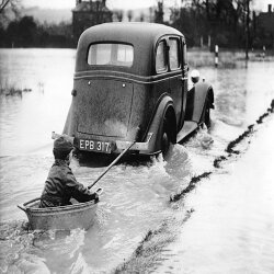 Holy Mackerel a tow through the floods retro black and white photographic card featuring a vintage image of extreme weather - 12.6 x 17.7cm and blank inside