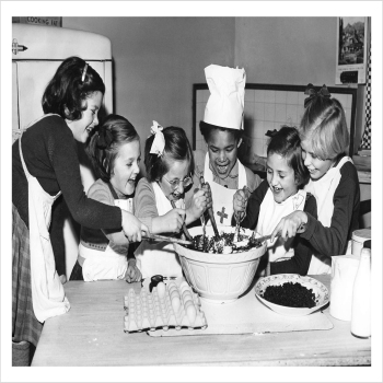 Stirring the Christmas pudding, a 127 x 175mm Alternative Image cookery themed Christmas card featuring a vintage black and white photo, message inside says Happy Christmas